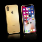 gold iphone Xs elite standing 1 scaled 1.jpg