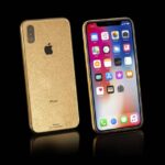 gold iphonex stardust standing 960x640 1.jpg
